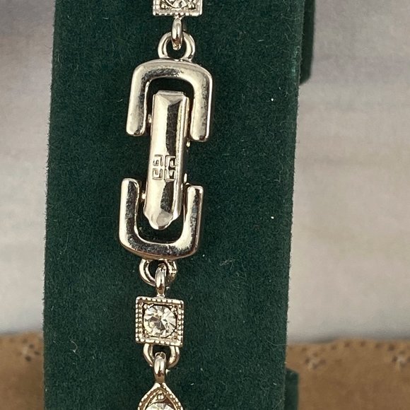 Givenchy Jewelry - Givenchy Silver Tone Crystal Tennis Bracelet Logo Givenchy Hinged ClaspBracelet